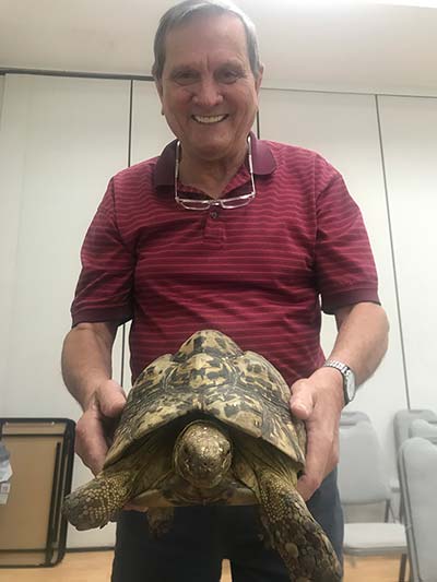 Nick holding a turtle
