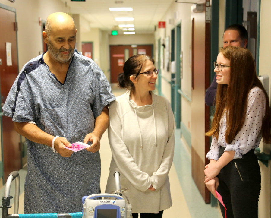 Emily walking with patient