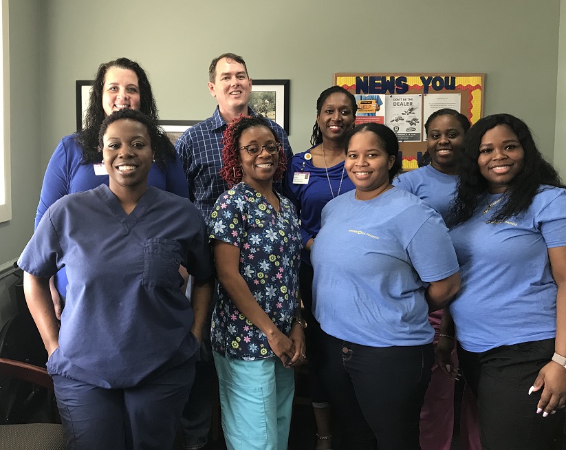 Teammates wear blue in recognition of Colorectal Cancer Awareness