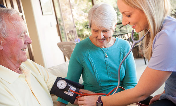 nurse taking blood pressure