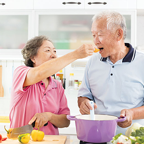 asian couple cooking