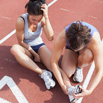 female high school student with ankle injury