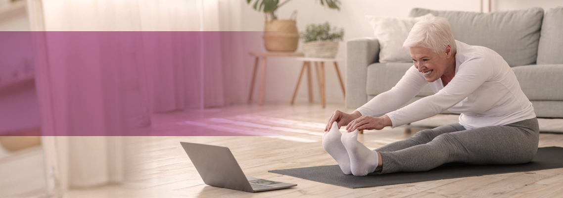 women strectching to virtual workout